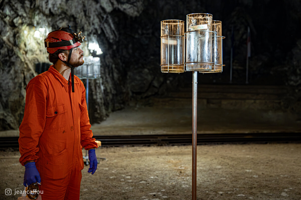 Raffaele Bruschi looks up at the glass collectors on a metal stand beside the railway in Plesna dvorana.